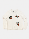 Jersey de punto con fresas bordadas
