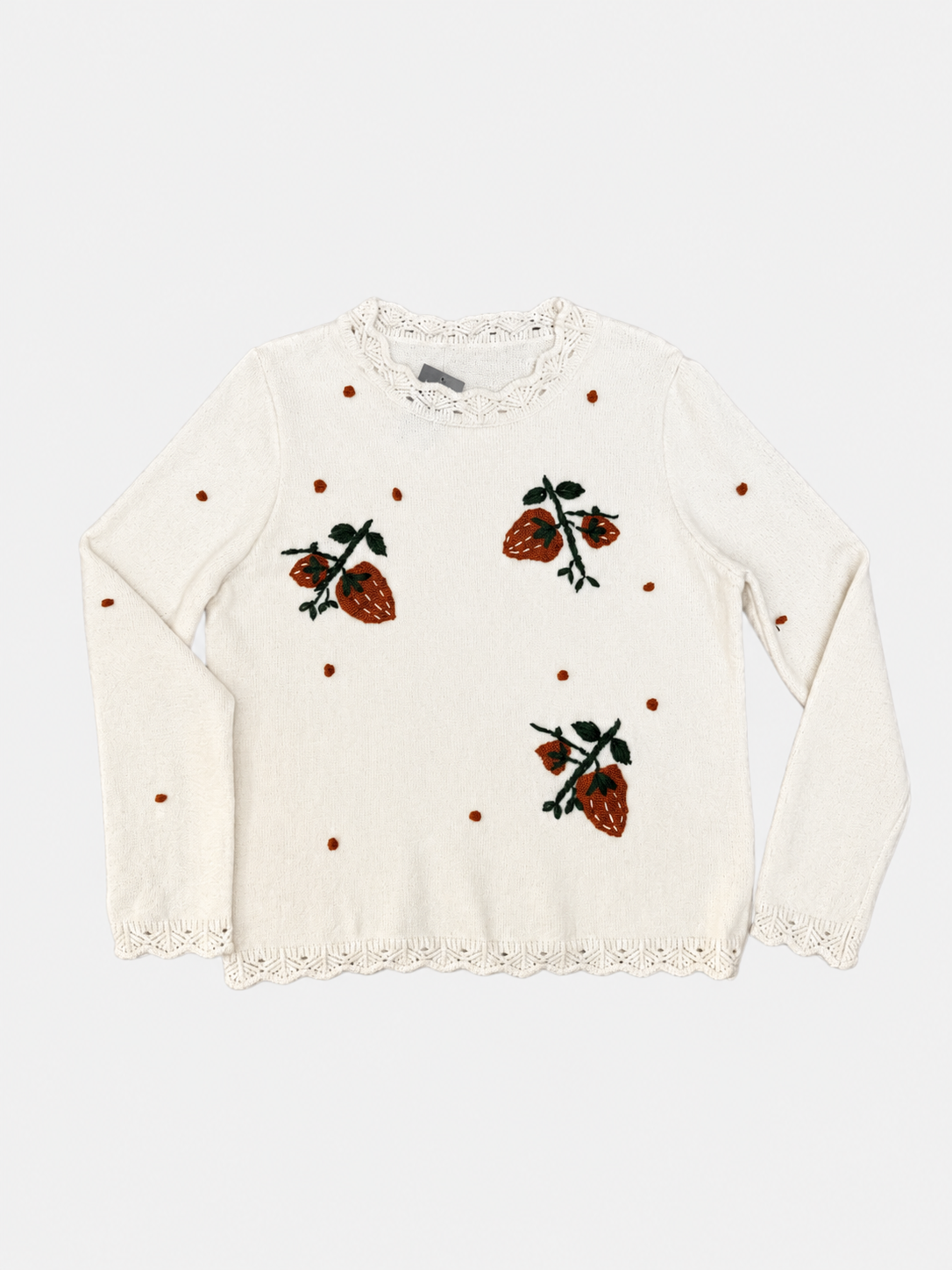 Jersey de punto con fresas bordadas